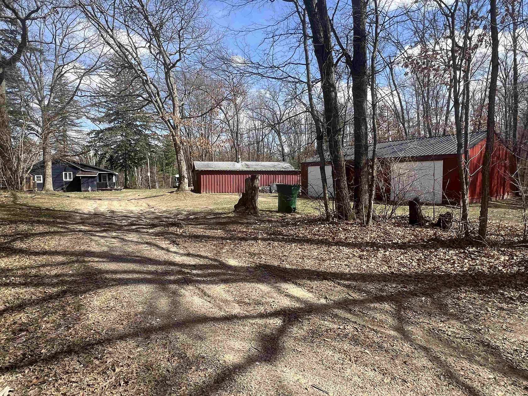 3.88 Acres of Land with Home for Sale in Harrison, Michigan