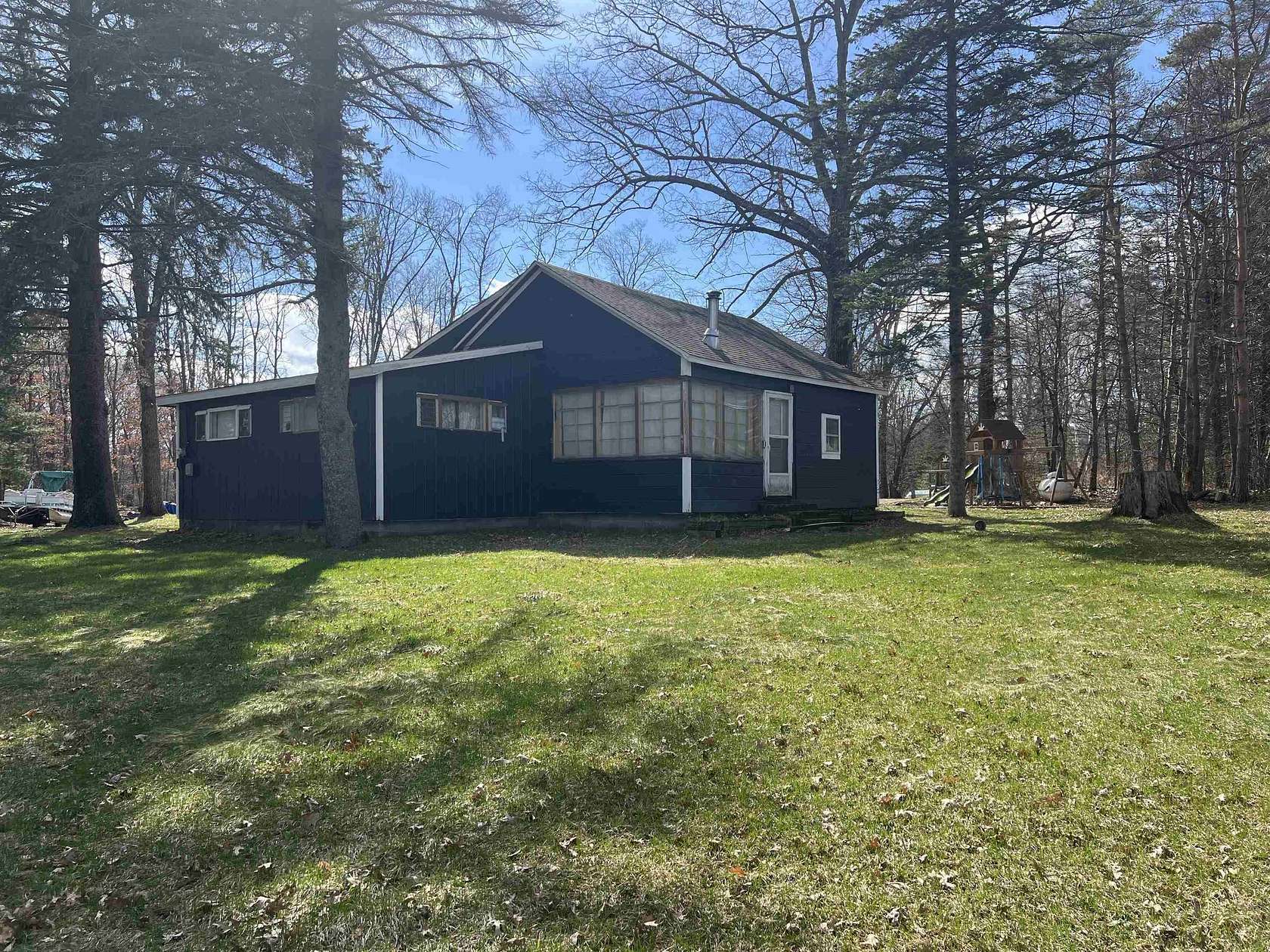 3.88 Acres of Land with Home for Sale in Harrison, Michigan