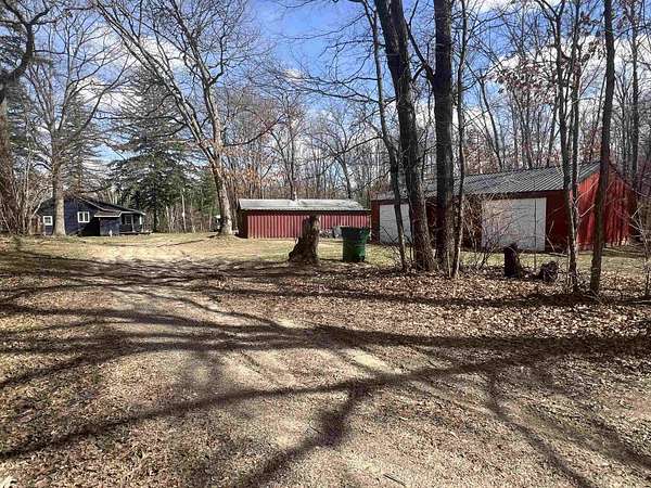3.88 Acres of Land with Home for Sale in Harrison, Michigan
