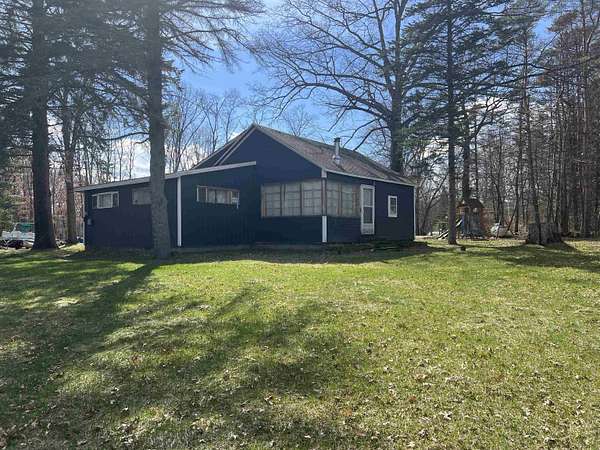 3.88 Acres of Land with Home for Sale in Harrison, Michigan