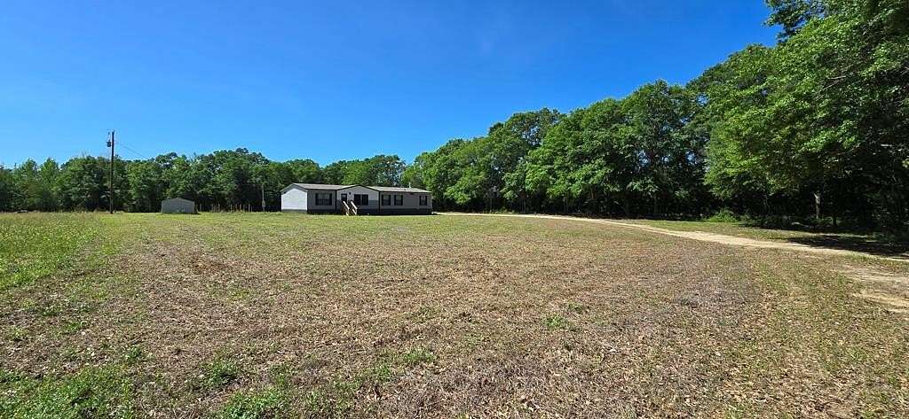 4.9 Acres of Land with Home for Sale in Slocomb, Alabama