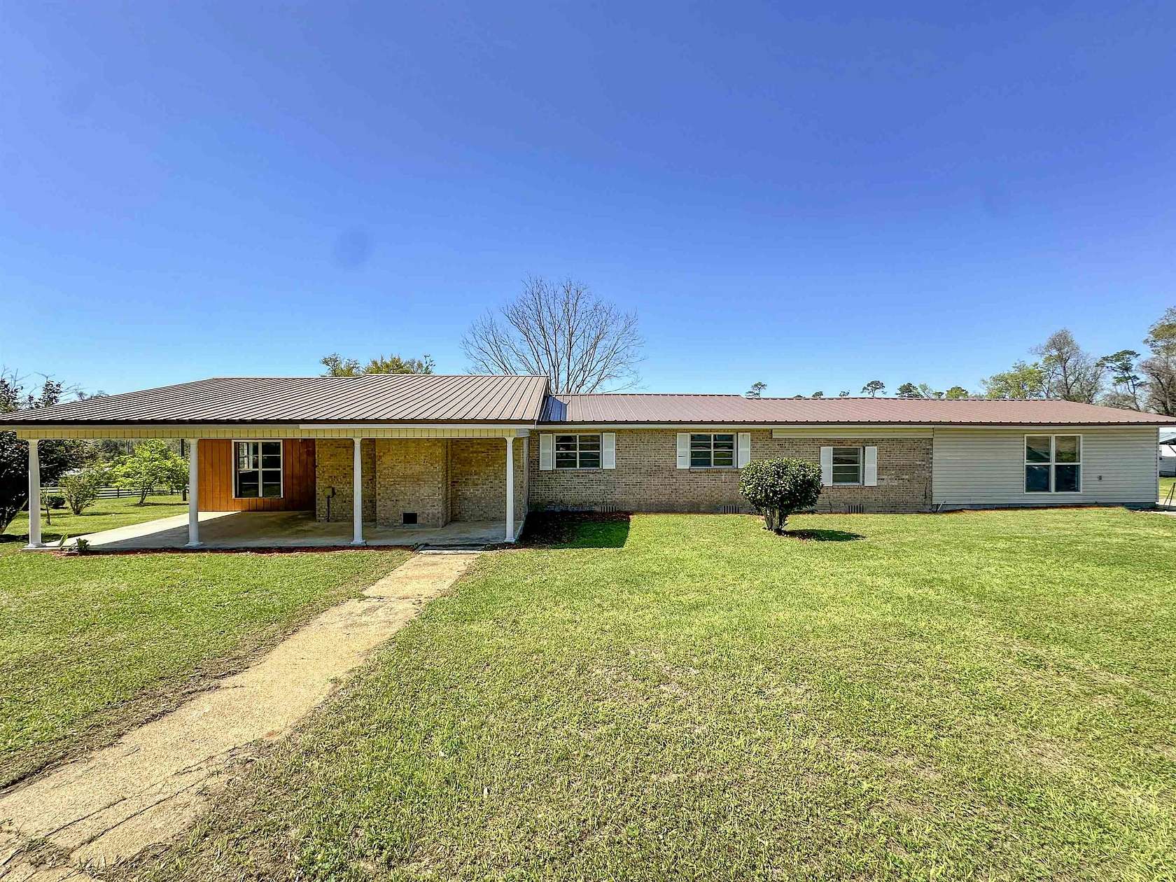 2.5 Acres of Land with Home for Sale in Sneads, Florida