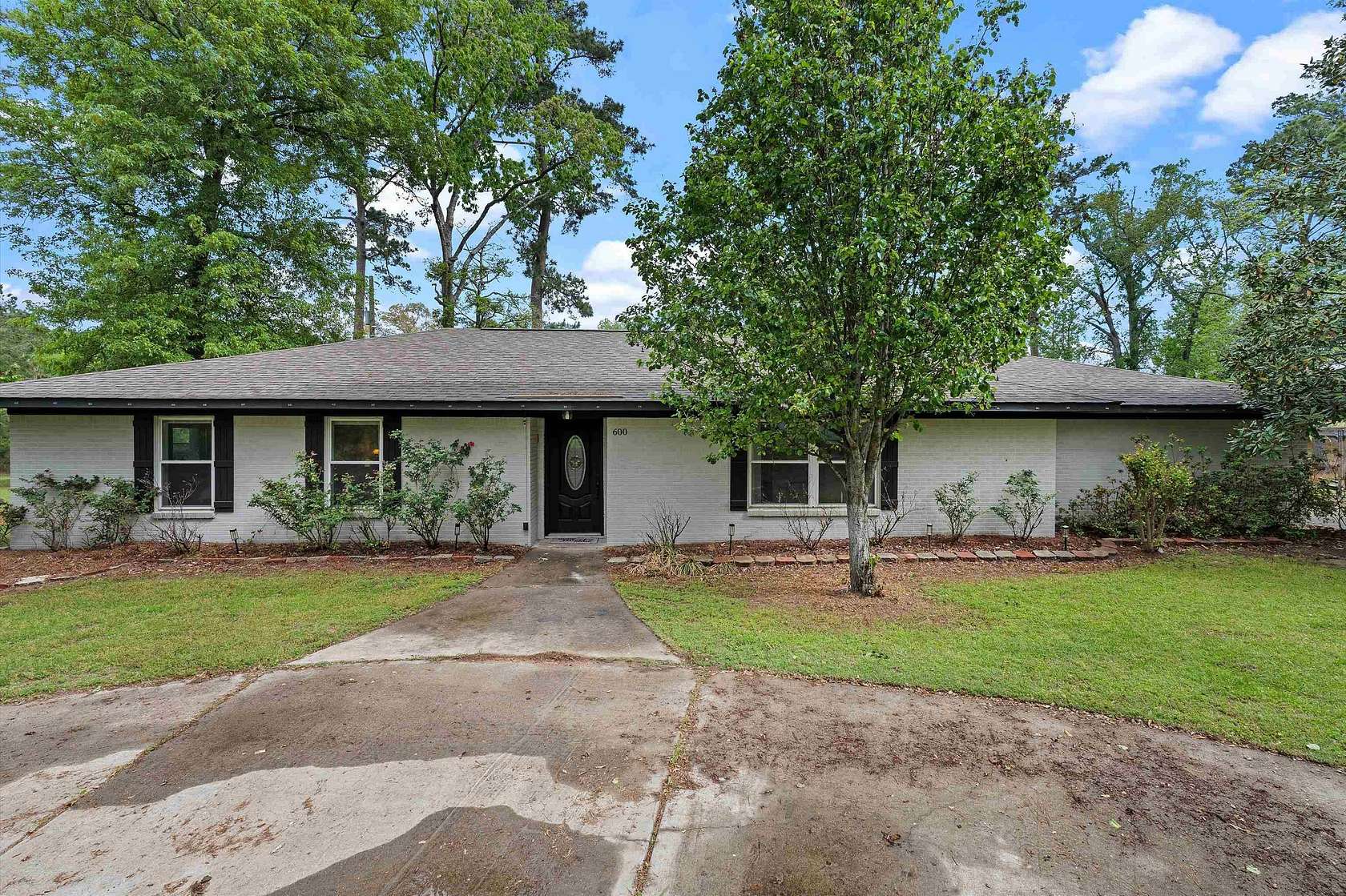 5 Acres of Land with Home for Sale in Carthage, Texas