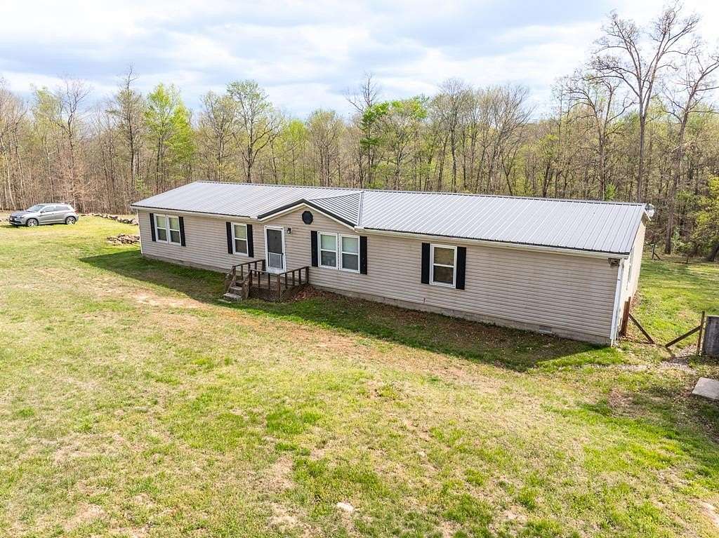 5.28 Acres of Land with Home for Sale in Otway, Ohio