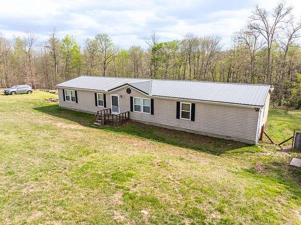 5.28 Acres of Land with Home for Sale in Otway, Ohio