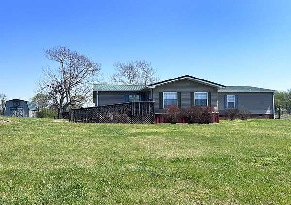 14.6 Acres of Land with Home for Sale in Hardyville, Kentucky