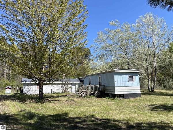 2.75 Acres of Land with Home for Sale in Beaverton, Michigan