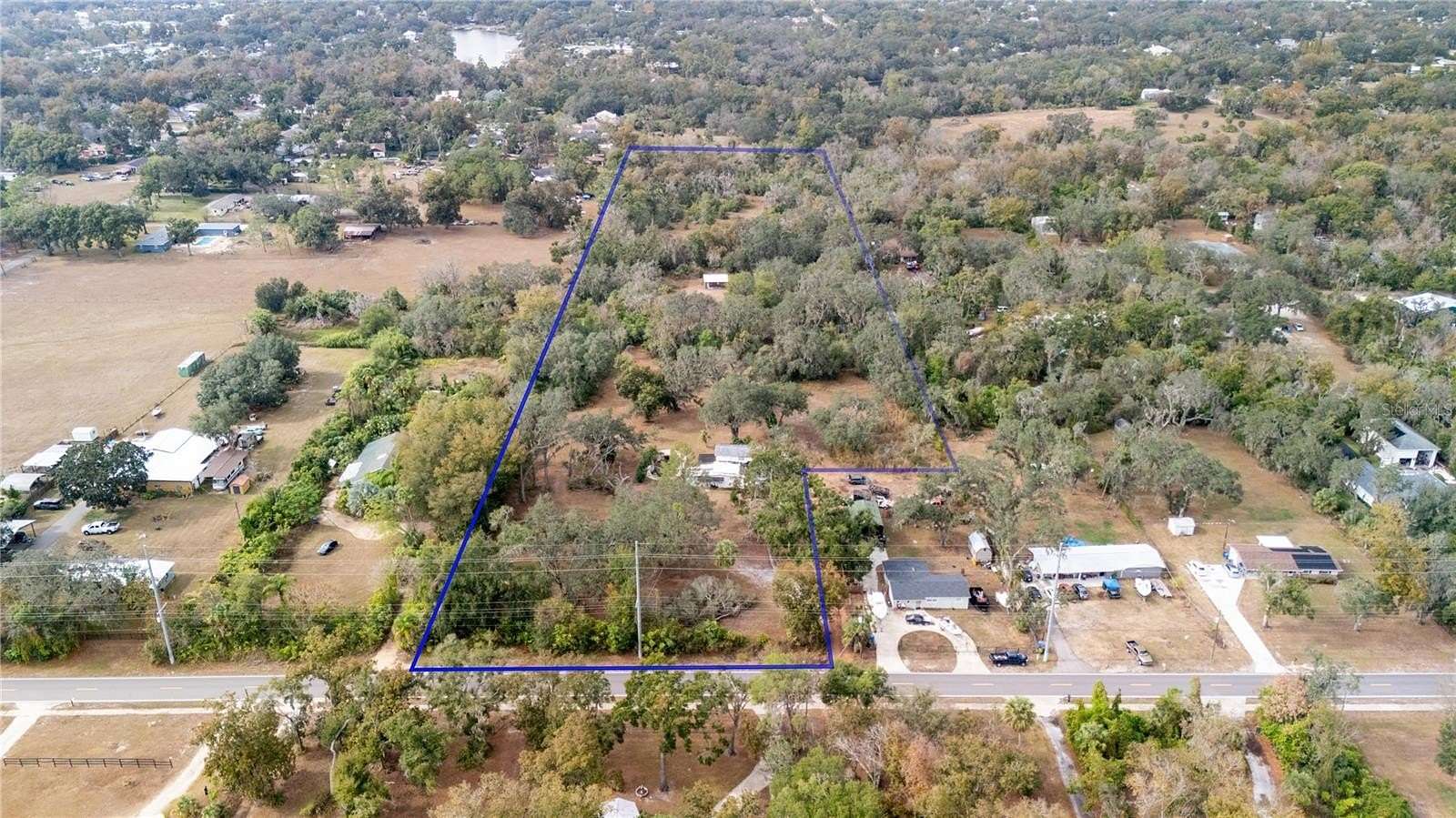 9.4 Acres of Land with Home for Sale in Riverview, Florida