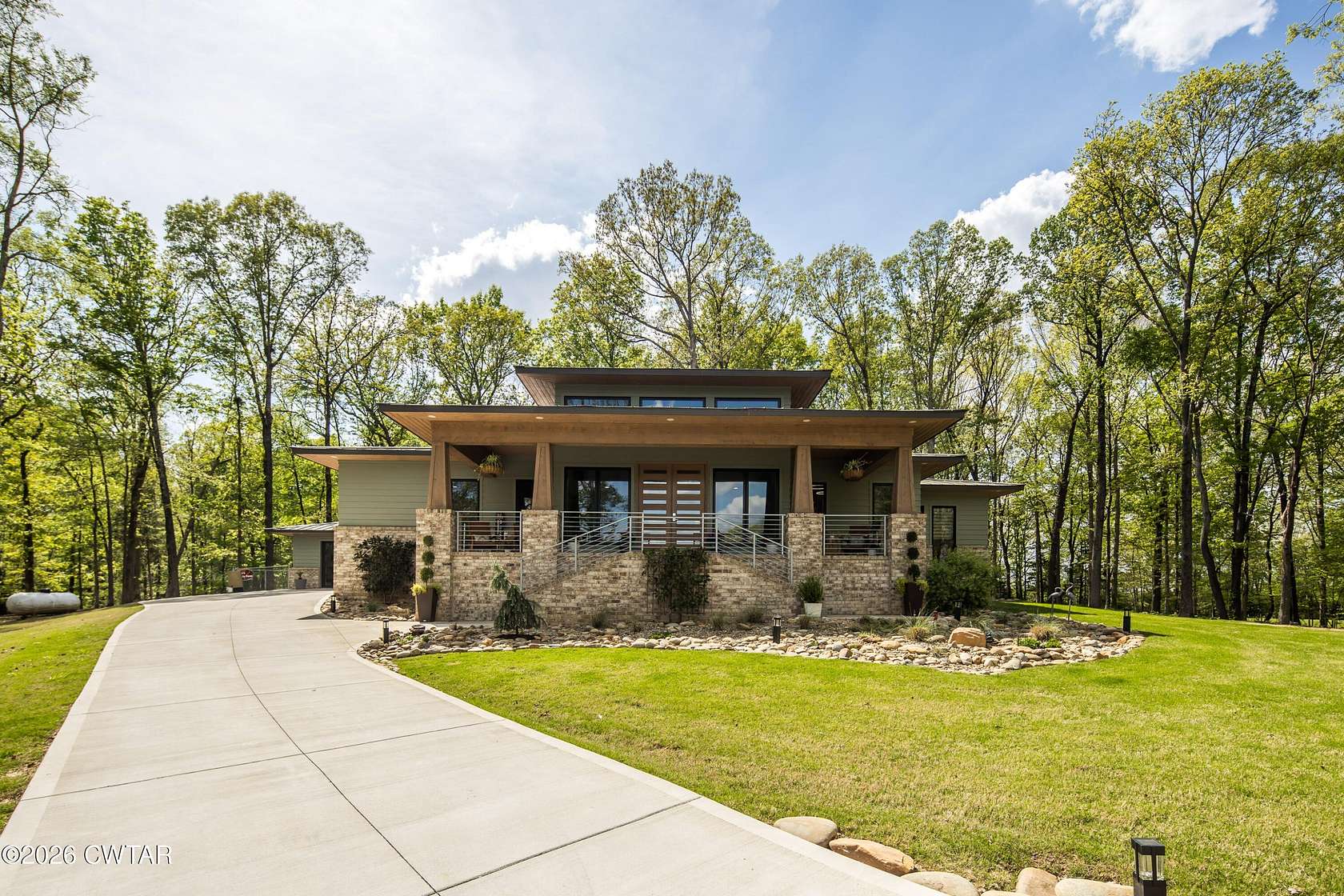 15.8 Acres of Land with Home for Sale in Gadsden, Tennessee