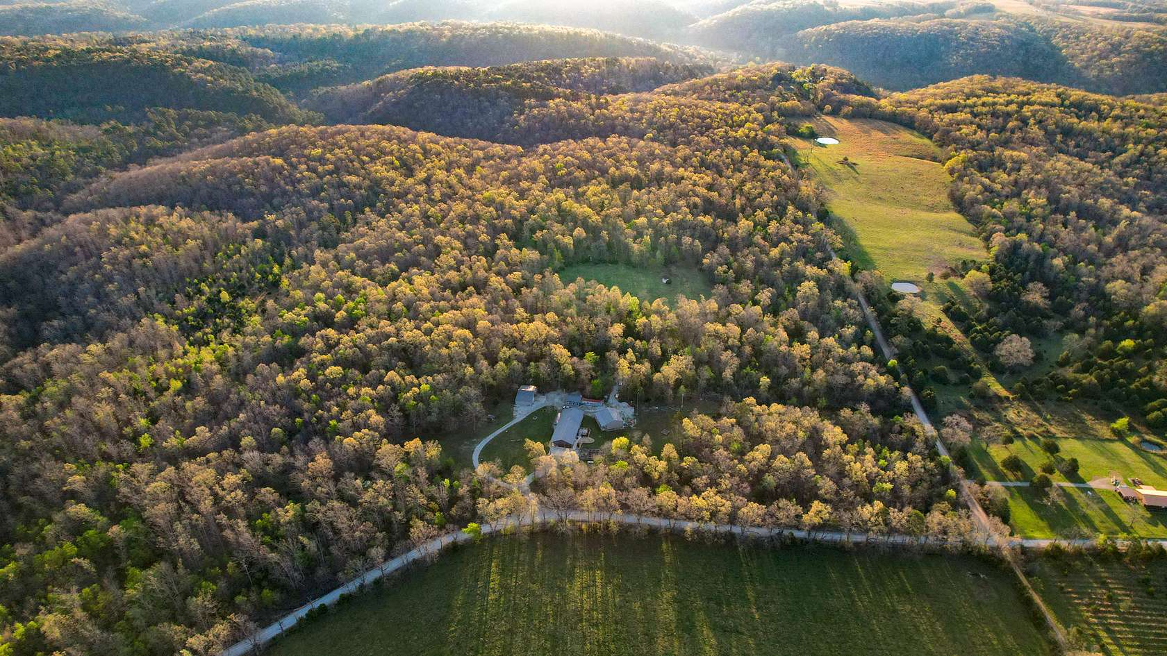 86 Acres of Recreational Land with Home for Sale in Dora, Missouri