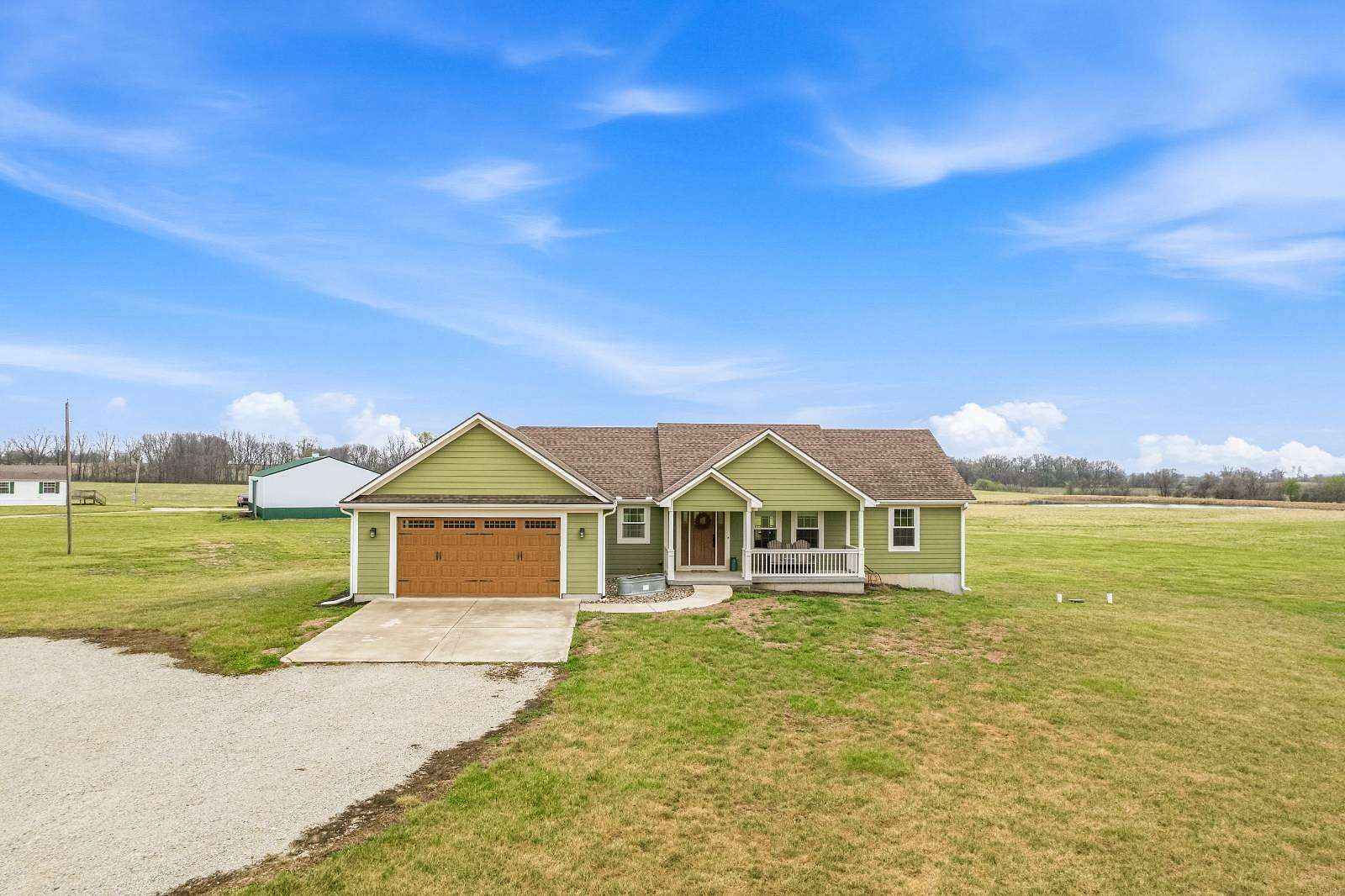 18 Acres of Land with Home for Sale in Freeman, Missouri