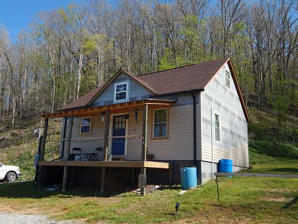 17.3 Acres of Land with Home for Sale in Lutts, Tennessee