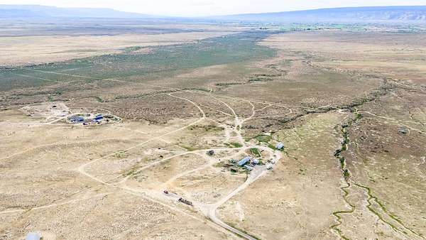 37.4 Acres of Land with Home for Sale in Loma, Colorado