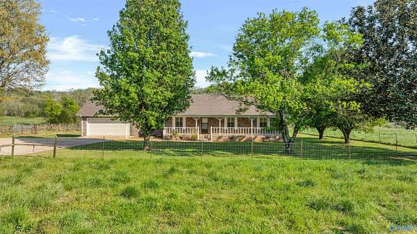 61 Acres of Agricultural Land with Home for Sale in Fort Payne, Alabama