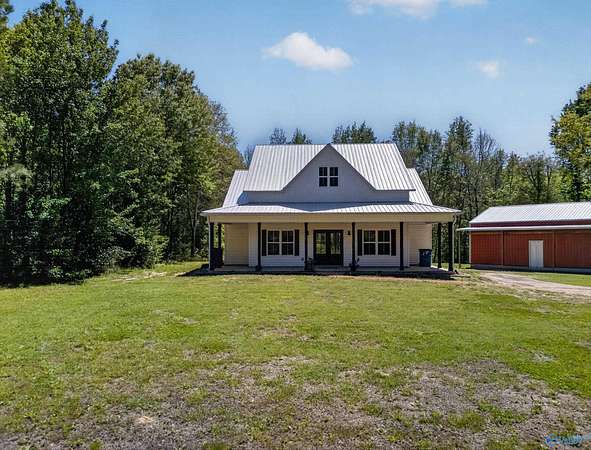 8.4 Acres of Land with Home for Sale in Arab, Alabama