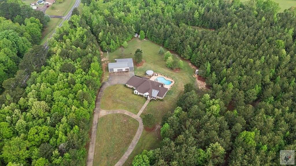 36.4 Acres of Land with Home for Sale in Atlanta, Texas