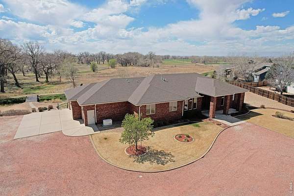 20.3 Acres of Recreational Land with Home for Sale in Platteville, Colorado