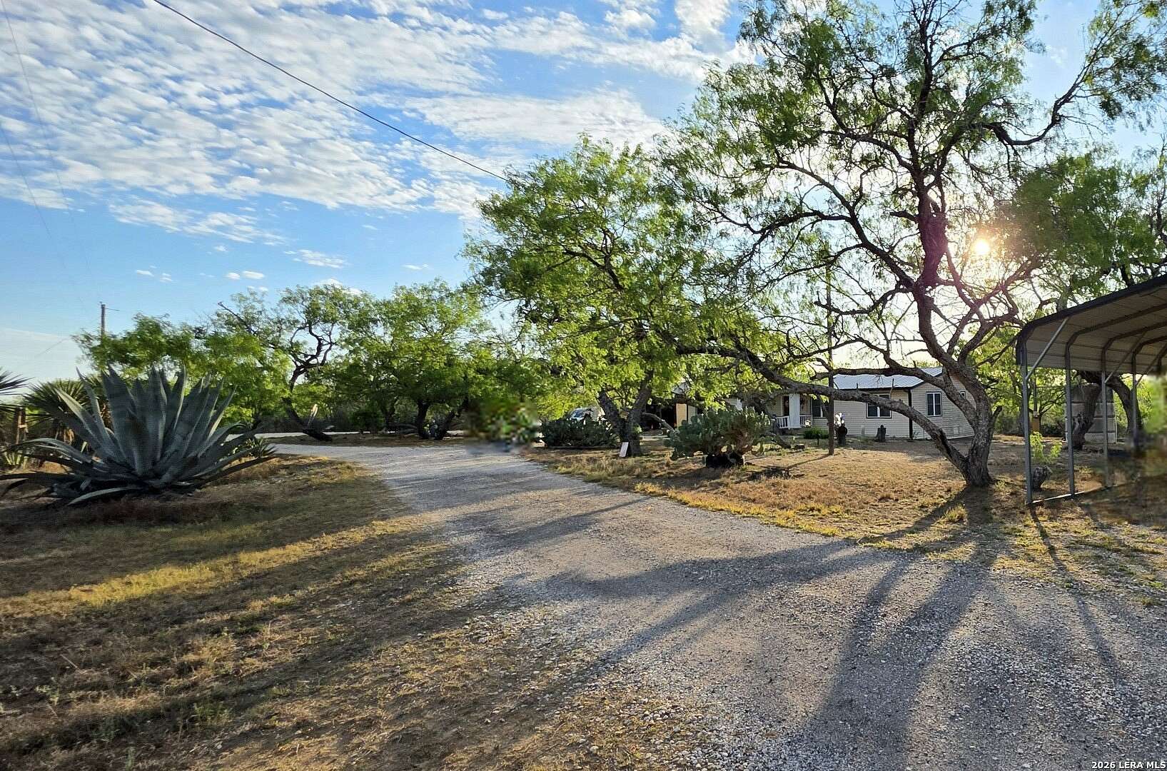 10 Acres of Land with Home for Sale in Floresville, Texas