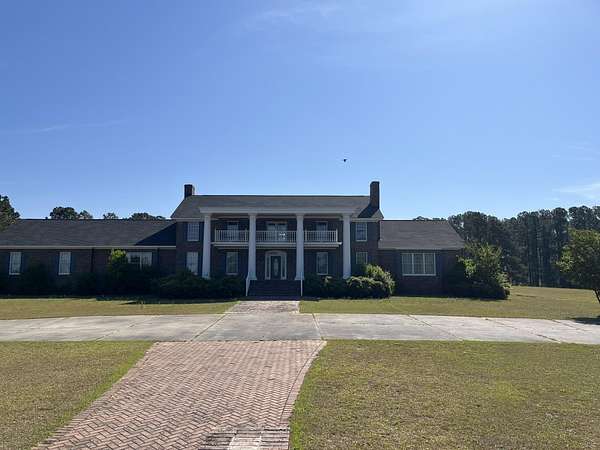 14.8 Acres of Land with Home for Sale in Dalzell, South Carolina