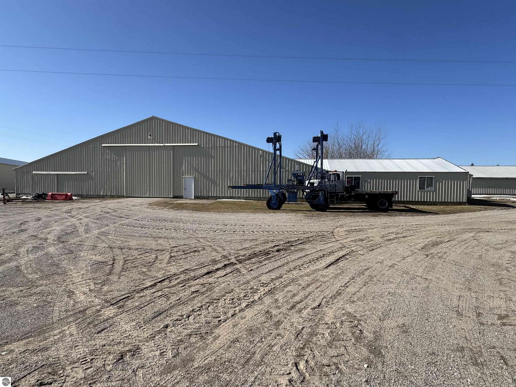 32.2 Acres of Improved Commercial Land for Sale in Kewadin, Michigan