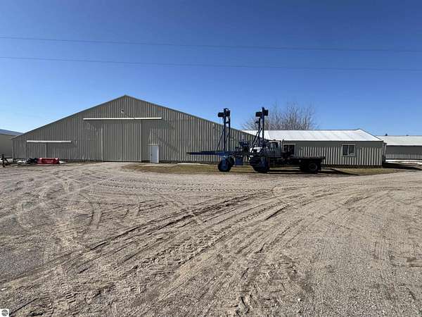 32.2 Acres of Improved Commercial Land for Sale in Kewadin, Michigan