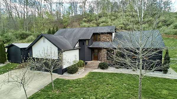 22.3 Acres of Land with Home for Sale in Scott Depot, West Virginia