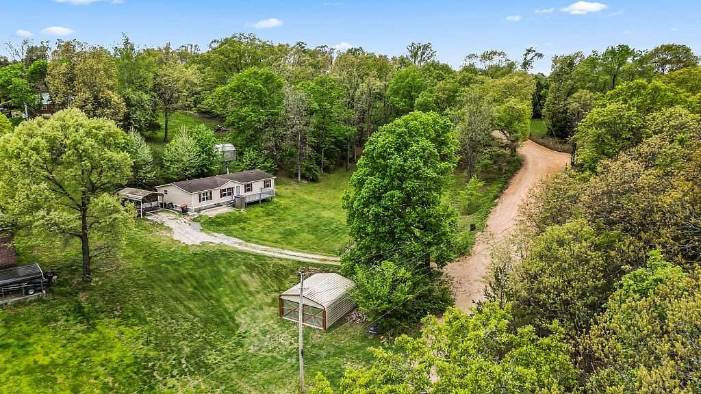 1.73 Acres of Land with Home for Sale in Lowell, Arkansas