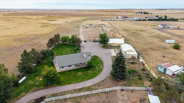 4.83 Acres of Land with Home for Sale in Bennett, Colorado