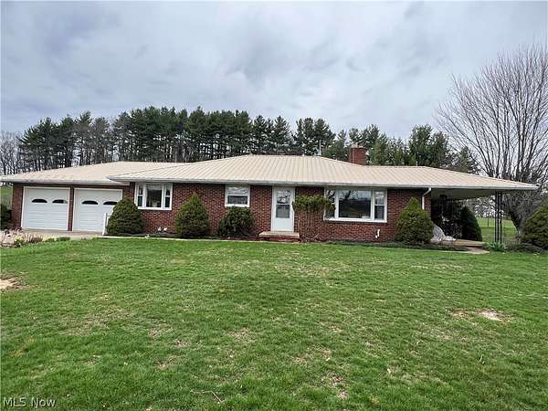 7.47 Acres of Land with Home for Auction in Carrollton, Ohio