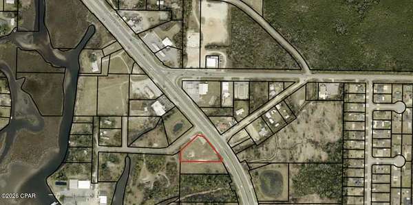 0.84 Acres of Commercial Land for Sale in Southport, Florida