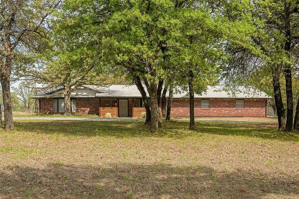 2.5 Acres of Land with Home for Sale in Harrah, Oklahoma