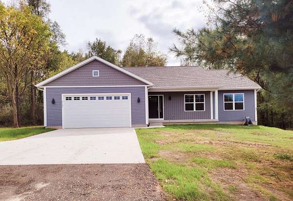 10 Acres of Land with Home for Sale in Fenwick, Michigan