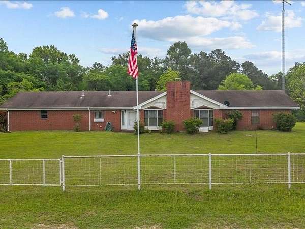 87.7 Acres of Land with Home for Sale in Elkhart, Texas