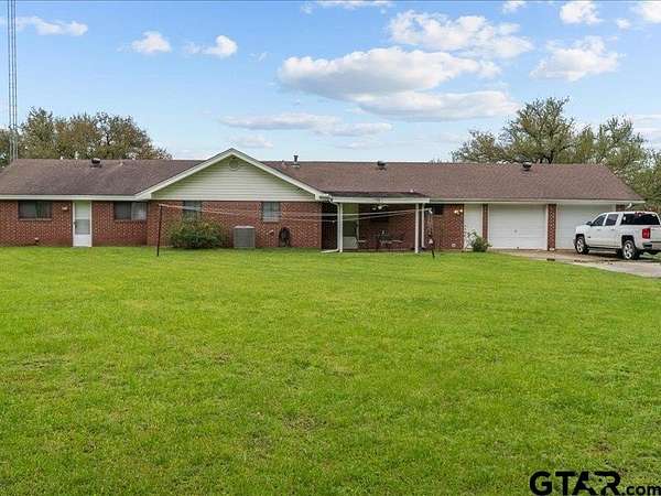 89 Acres of Land with Home for Sale in Elkhart, Texas