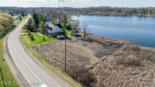 0.63 Acres of Residential Land for Sale in Oceola Township, Michigan