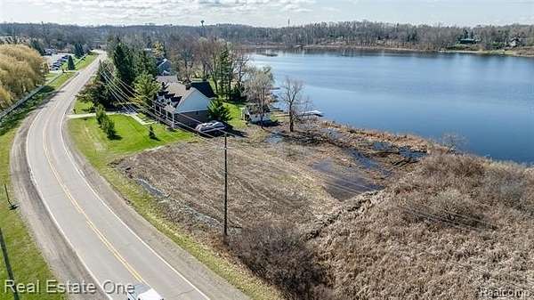 0.63 Acres of Residential Land for Sale in Oceola Township, Michigan