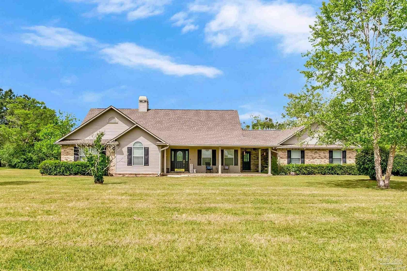 8.38 Acres of Land with Home for Sale in Molino, Florida