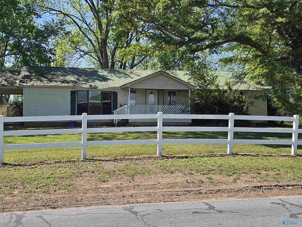 5.1 Acres of Land with Home for Sale in Section, Alabama