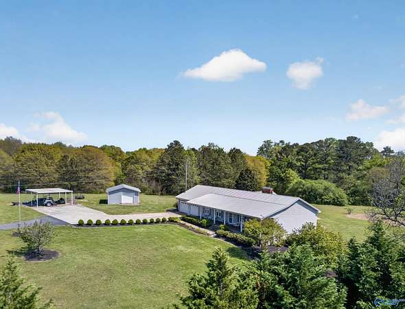 9.3 Acres of Land with Home for Sale in Albertville, Alabama
