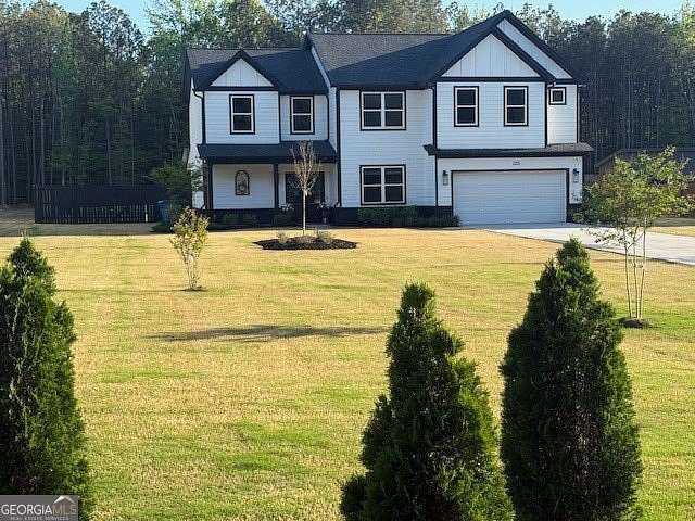 1.5 Acres of Land with Home for Sale in Lawrenceville, Georgia