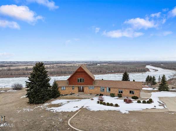 5.43 Acres of Land with Home for Sale in Williston, North Dakota