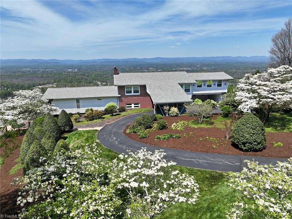 27.7 Acres of Land with Home for Sale in Moravian Falls, North Carolina