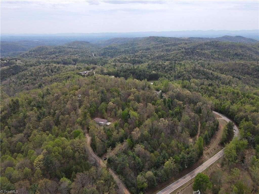 15.4 Acres of Land with Home for Sale in Millers Creek, North Carolina