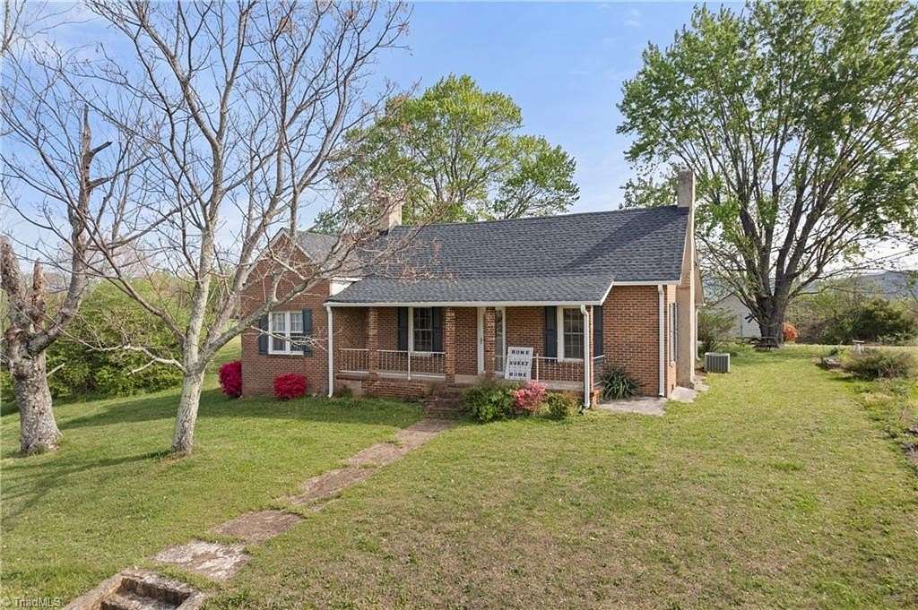 1.5 Acres of Land with Home for Sale in Pinnacle, North Carolina