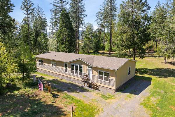 9.84 Acres of Land with Home for Sale in Cave Junction, Oregon