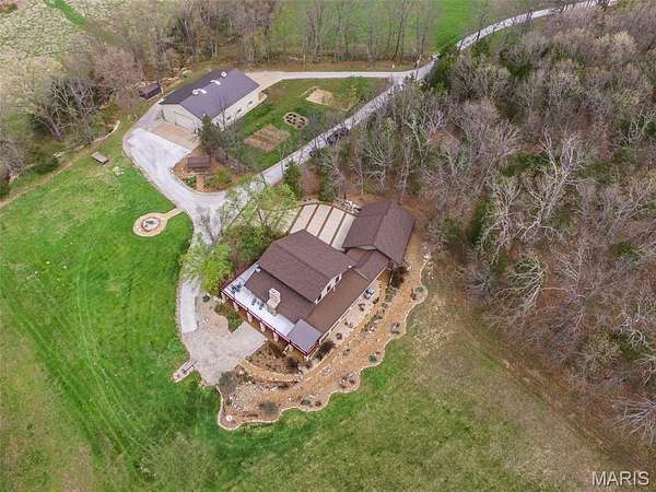 40 Acres of Land with Home for Sale in Cedar Hill, Missouri