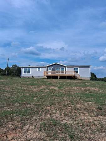 4.16 Acres of Land with Home for Sale in Kings Mountain, Kentucky