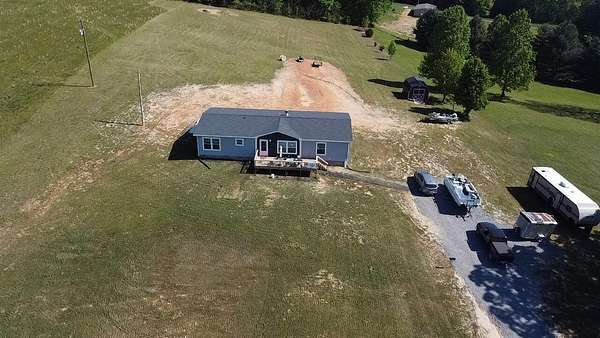 4.16 Acres of Land with Home for Sale in Kings Mountain, Kentucky
