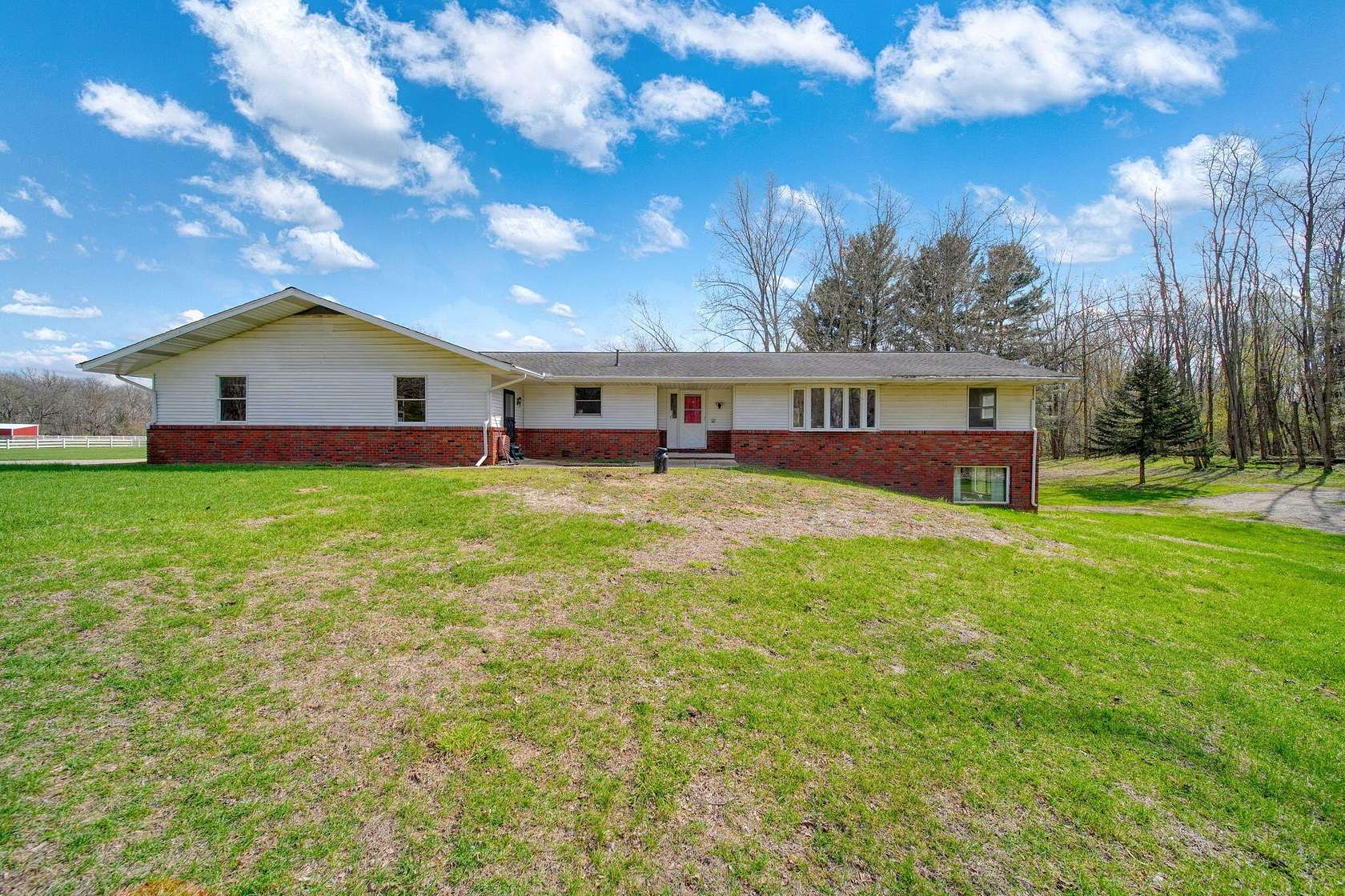 16 Acres of Land with Home for Sale in Clarklake, Michigan