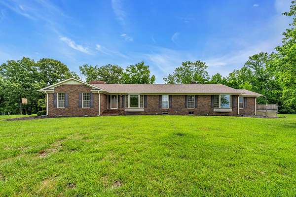 5.8 Acres of Land with Home for Sale in Lawrenceburg, Tennessee